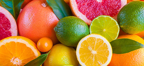 Lemons, limes, and grapefruits cut in half