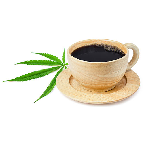 Tea cup of tea with a cannabis leaf on the saucer