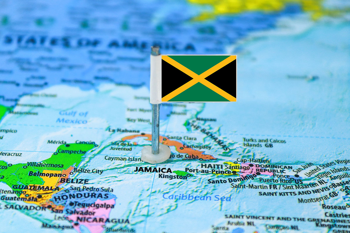 Map of the Caribbean with a Jamaican flag pin placed on Jamaica