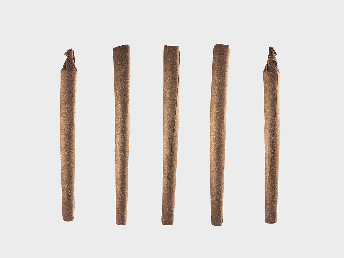 Five marijuana blunts lined up