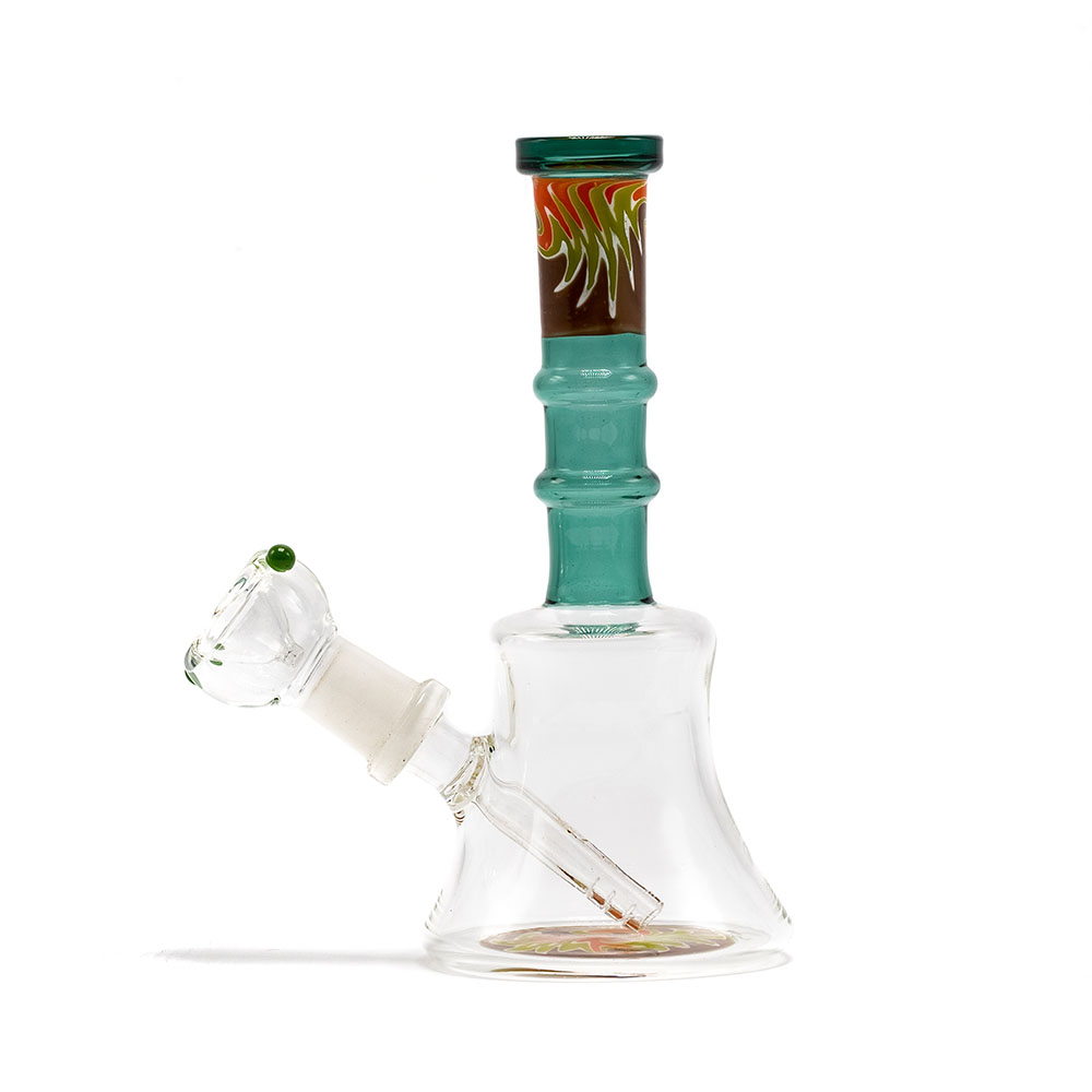 Beaker bong with a clear glass base and a green tube