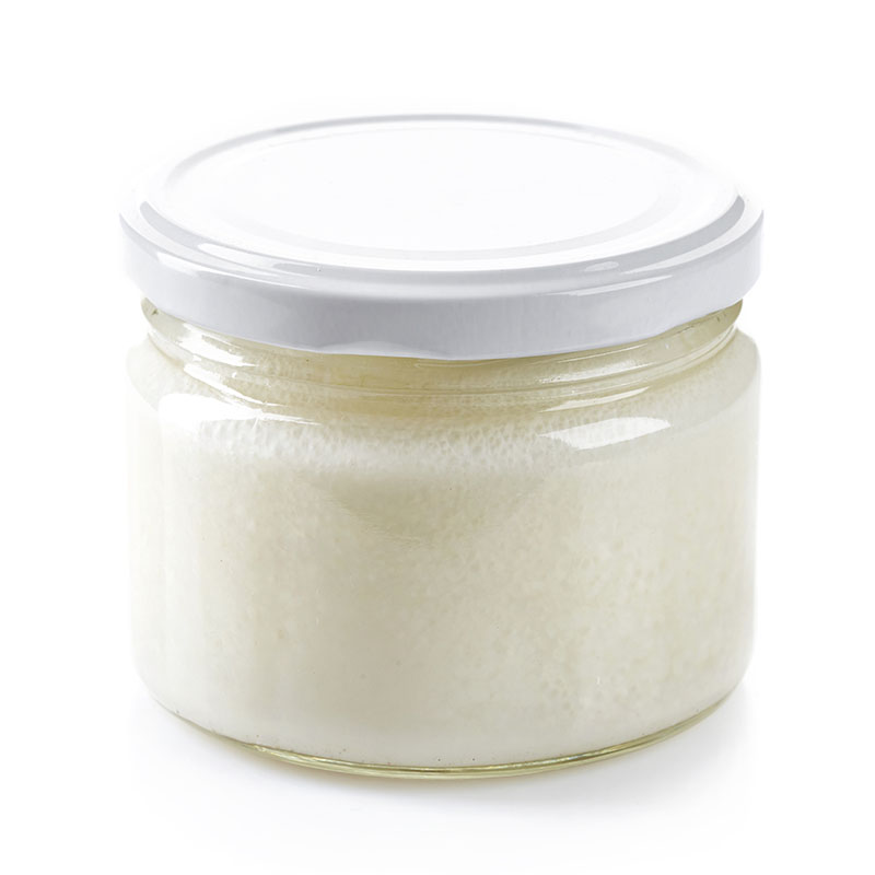 Coconut oil in a clear glass jar