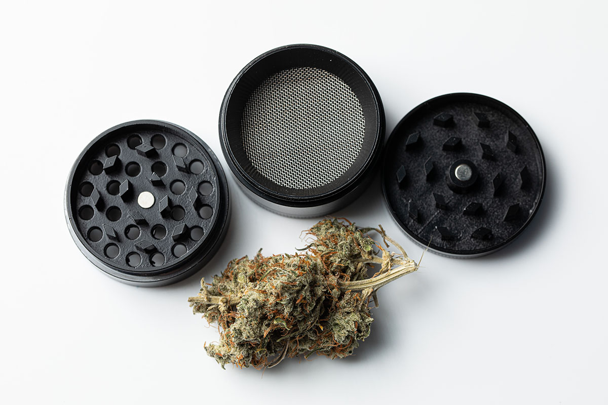 Disassembled three-piece grinder