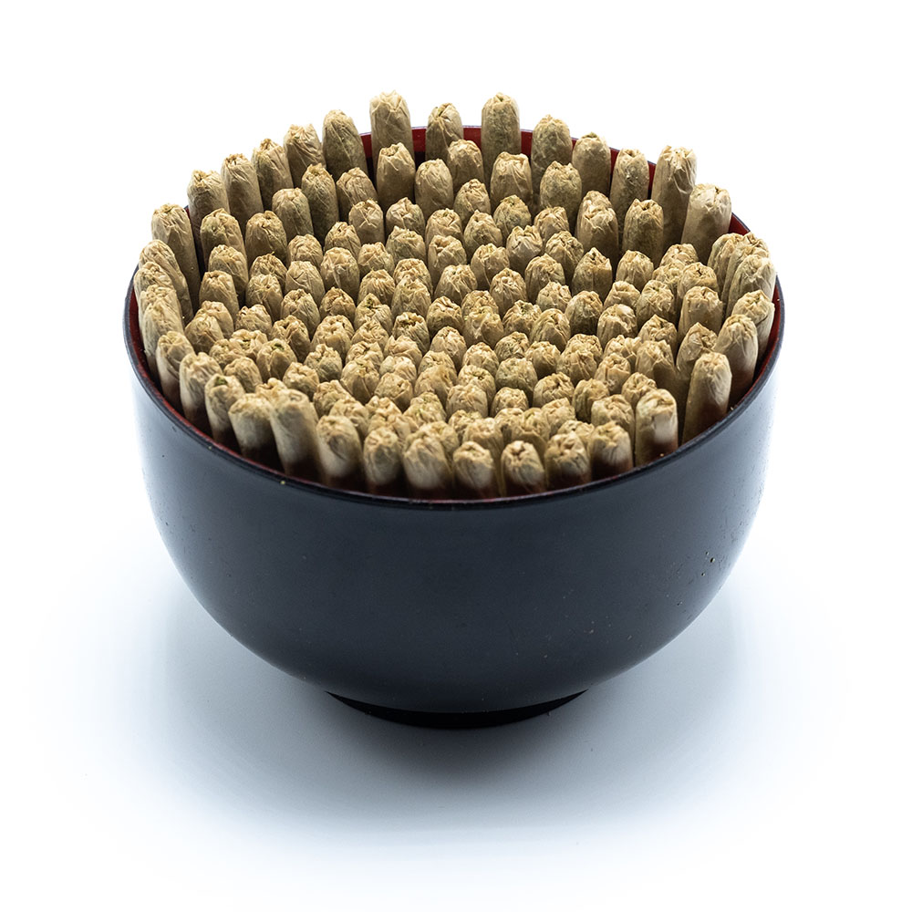 Marijuana joints in a black bowl