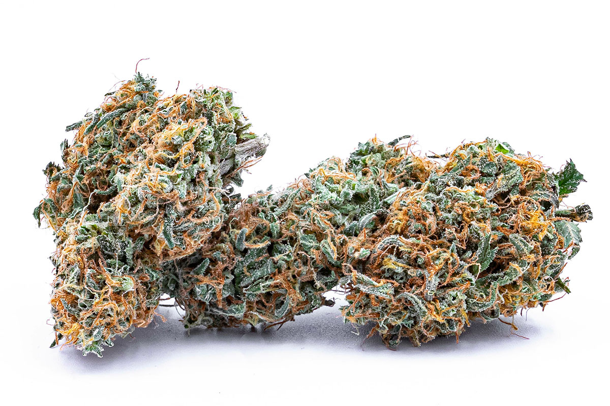 Eighth of cannabis flower on a white background