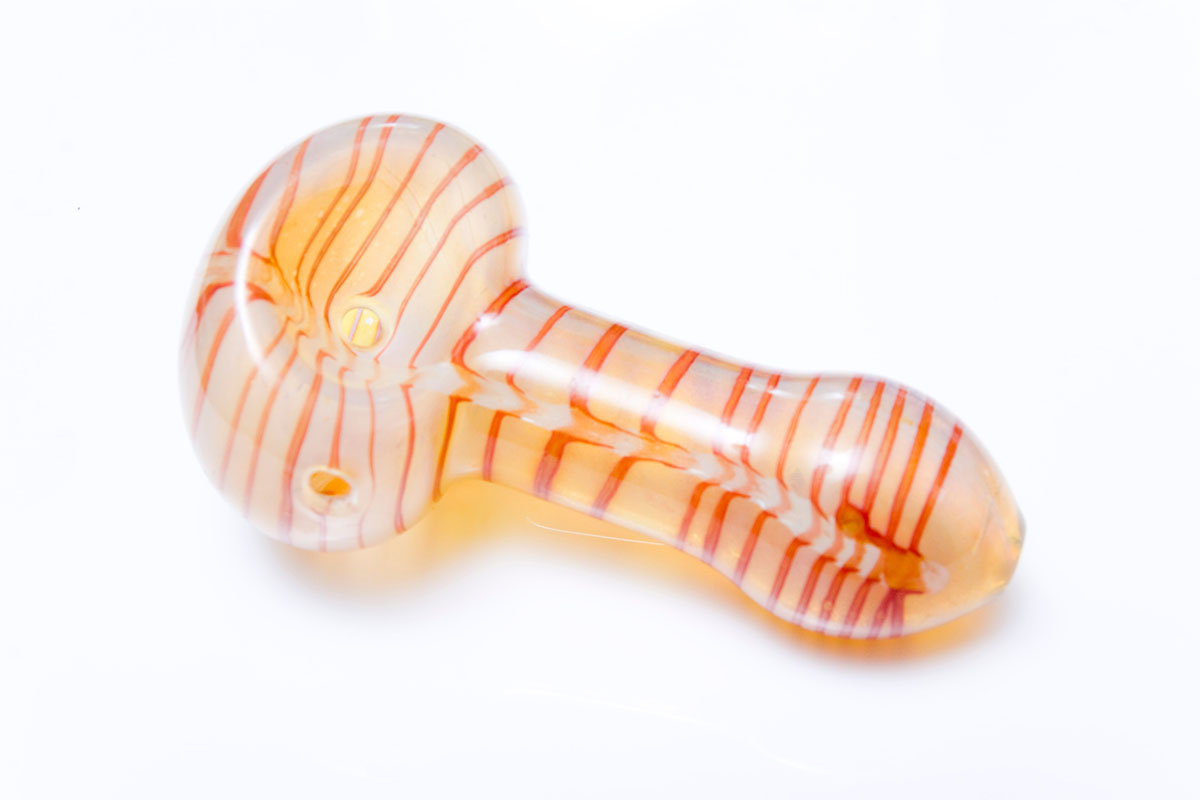 Pink and orange glass hand pipe