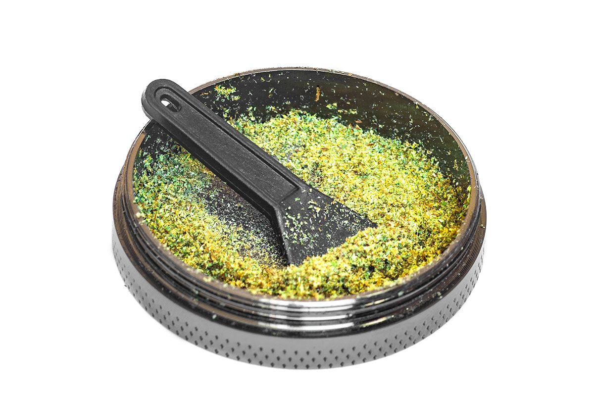 Kief in a grinder's kief catcher
