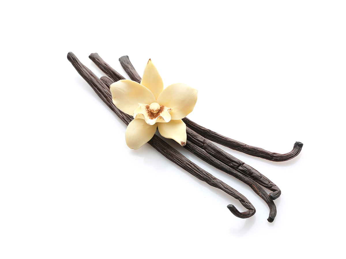 Vanilla sticks with a white flower on top